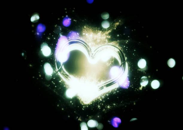 Abstract heart shape shining in the night sky
