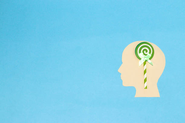 istock paper head with brain lollipop, creative art design and copy space, blue background 1410630440