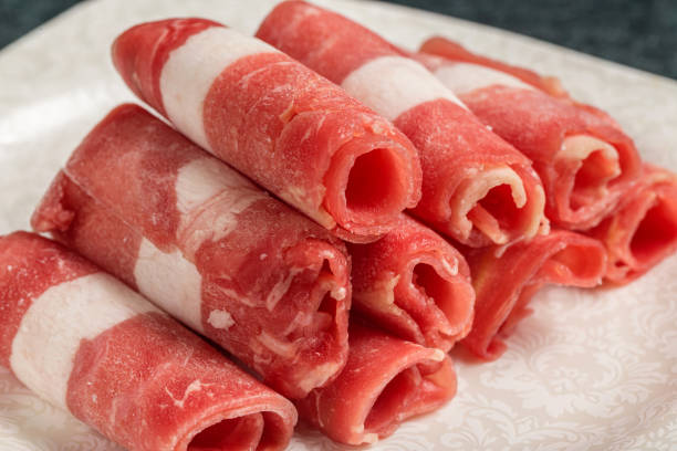 Fresh and delicious lamb rolls Mutton rolls are indispensable for eating hot pot mutton roll for chinese hot pot stock pictures, royalty-free photos & images