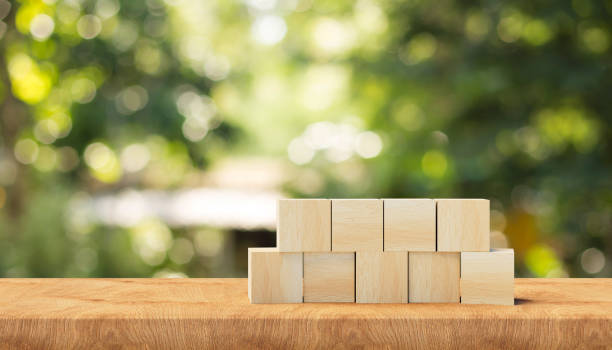 istock 3d Wooden cubes on a wooden surface. 3d information background. 3d rendering 1410635121