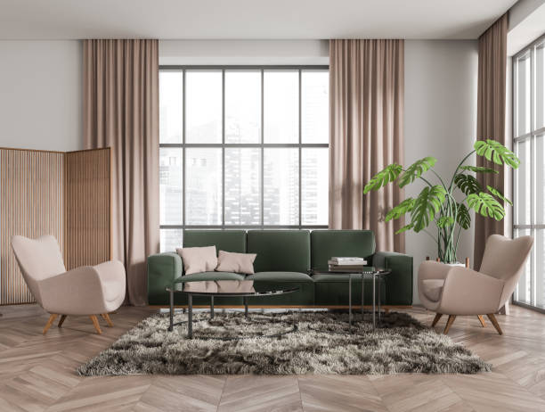 istock Light relax room interior with couch and armchair, panoramic window 1410637340