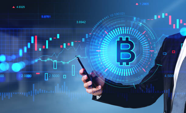 istock Businessman hand with smartphone, cryptocurrency data and internet banking 1410637946