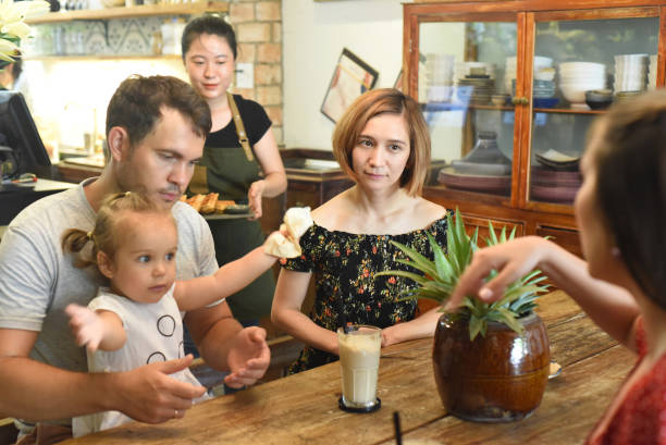 istock Young people communicate with each other in cafe 1410638753