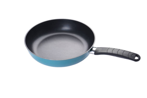 istock New frying pan isolated on white background. 1410639075