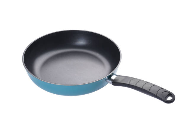 istock New frying pan isolated on white background. 1410639135