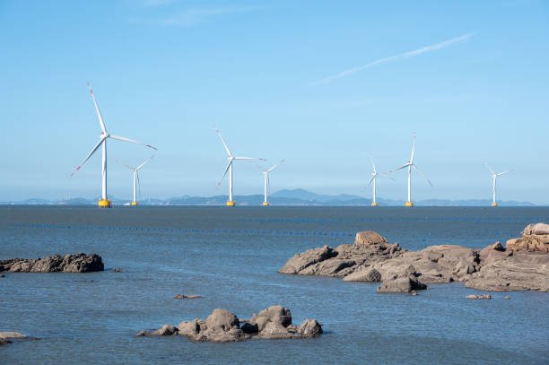 istock Reefs and wind turbines in the sea 1410640132