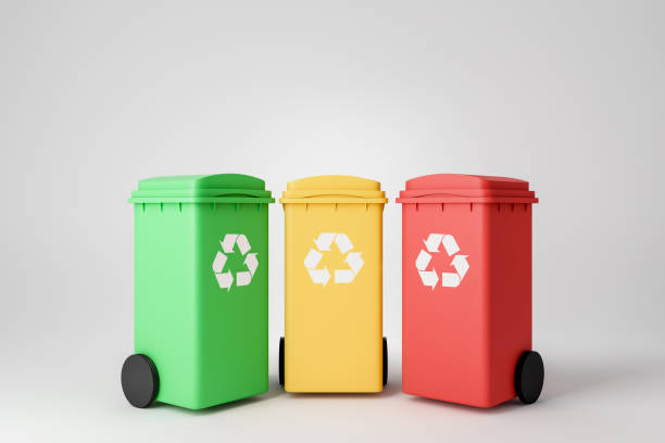 istock Three recycle bins in row, concept of waste sorting. Copy space 1410640495