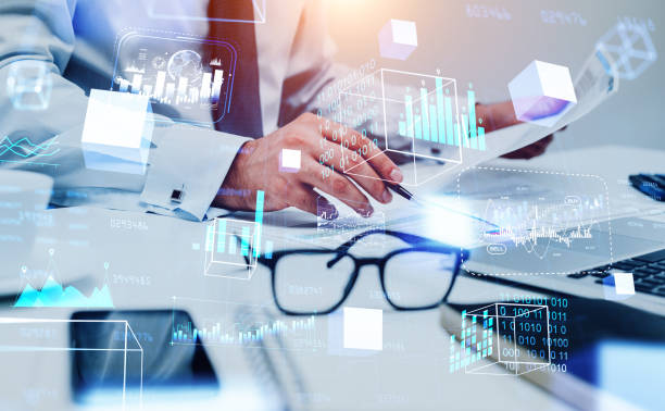 istock Businessman with papers, data blocks in cyberspace, financial analysis 1410640882