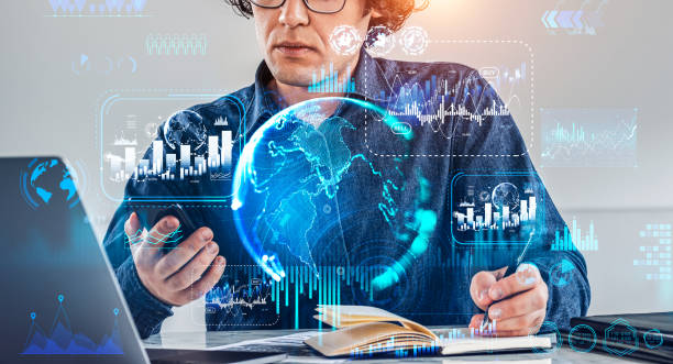 istock Businessman working with phone, forex chart with digital data and earth globe 1410640978