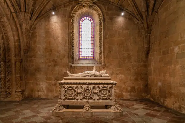 Photo of Vasco da Gama's sarcophagus stands under the gallery of the famous Mosteiro dos Jeronimos, Belem, Lisbon, Portugal