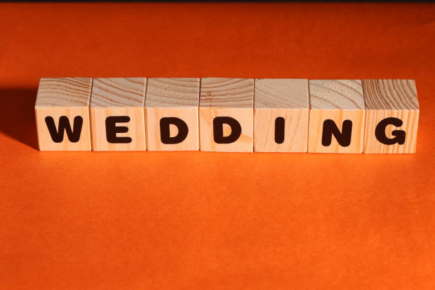 istock WEDDING word on wooden cubes 1410642084