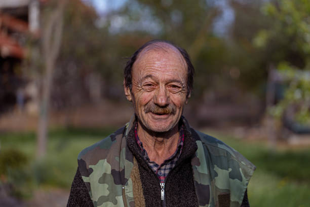Senior exhausted veteran looking at camera