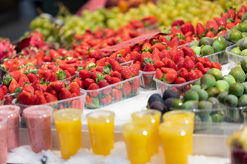 Close up picture of delicious juicy fruits at the central market in Valencia, Spain