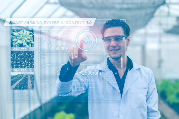 istock modern farmer using advance technology smart farming AI system to monitor control agriculture plant farm.visual hologram digital graphic interface overlay effect . 1410645967