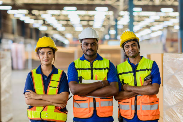istock Group of engineer people Indian worker Hispanic Latin confident standing smile in large factory warehouse 1410646064