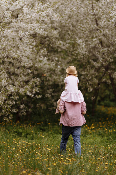 istock Father and little daughter are walking. 1410650519
