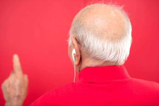 Man holding headphones in the hands of a man lifestyle modern style technology cropped view. High quality photo