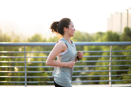 https://media.istockphoto.com/id/1410651813/photo/asian-young-woman-running-in-the-city-street-in-the-morning.jpg?b=1&s=170667a&w=0&k=20&c=Ac4PaRVs3MDNvS9AGyA6jT-pjiKC3KfZxfssqwW3p7Q=