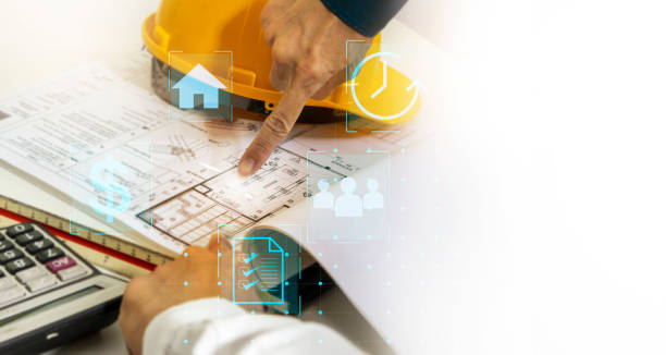 istock Architects and engineers plan the construction. Effective budgeting and time management,House plans, construction business and real estate 1410651928