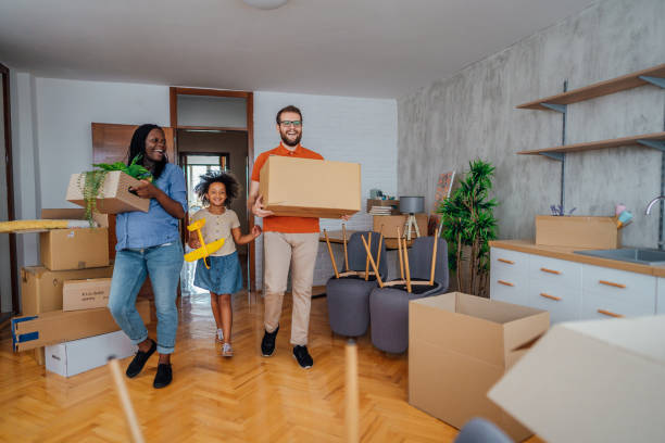 istock Multi-ethnic family moving in new home 1410655102
