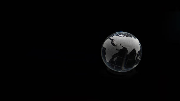istock Glass crystal globe ball shine in dark background with black copy space internation global concept 1410656254