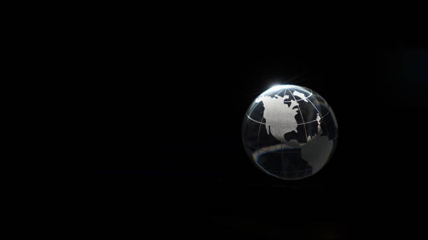 istock Glass crystal globe ball shine in dark background with black copy space internation global concept 1410656265