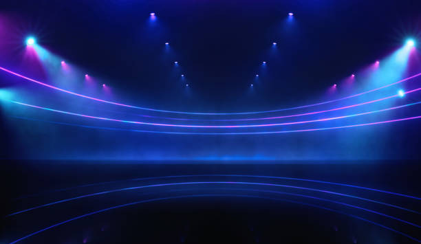 Abstract blue color lines on black background illuminated by top lamps. Dynamic curves and blues pattern. Science and technology concept
