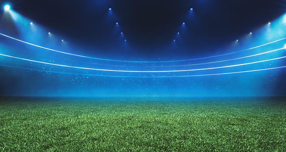 Vista digital del estadio de fútbol iluminada por focos azules y campo de césped verde vacío. Tema deportivo digital 3D fondo publicidad ilustración diseño plantilla photo