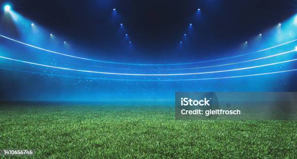 Digital Football Stadium View Illuminated By Blue Spotlights And Empty Green Grass Field Sport Theme Digital 3d Background Advertisement Illustration Design Template Stock Photo - Download Image Now