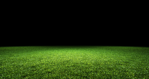 Abstract sport stadium green grass with black top copy space background. Product copy space template background