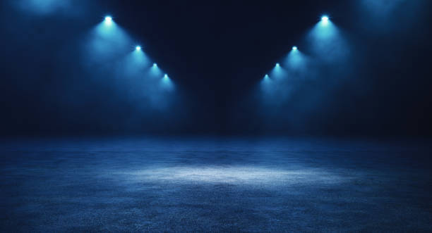 istock Flat concrete place lit by spotlights from top 1410656815