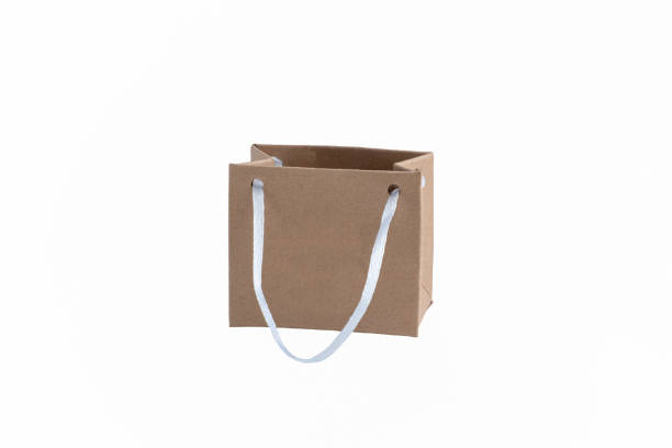 istock Paper bag on a white background. Retail trade. Consumerism 1410665417