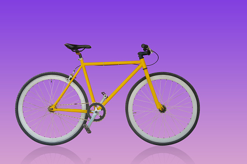 side view old yellow and black bicycle on gradiant violet background, object, fashion, sport, relex, copy space