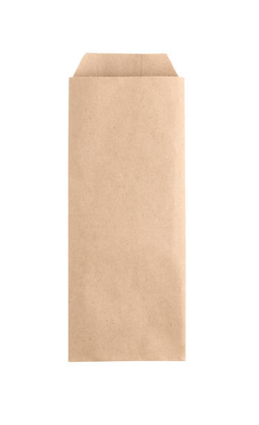 istock Small narrow kraft paper envelope, isolated on white background 1410677016