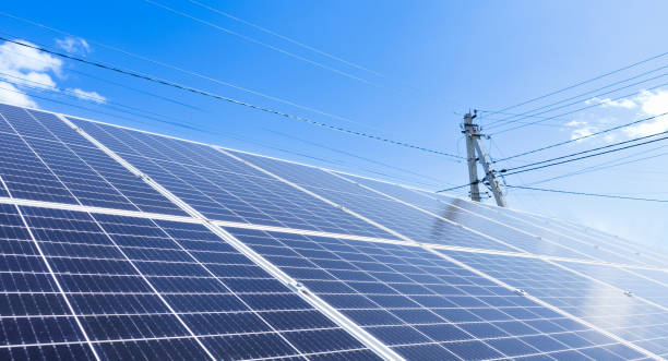 istock Solar panels on the sky background. Clean green energy concept 1410678506