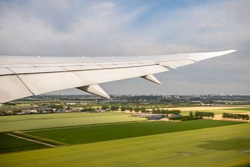 View to a Dutch countryside during taking off with a Boeing 787 from Schiphol Airport