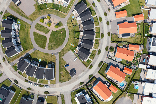 Various houses around a circle shaped street viewed from above. Strängnäs, Sweden.
