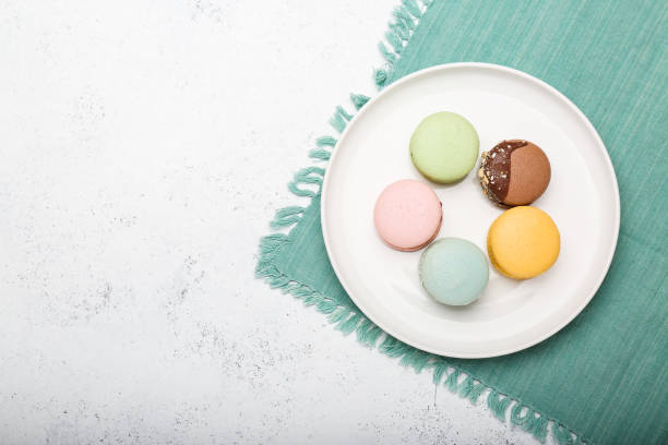 istock macaroons of different colors on a white plate. top view 1410691449