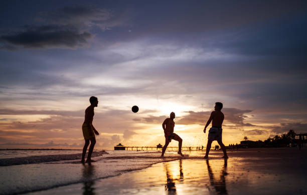 Playing soccer on the beach in Ft. Myers Florida