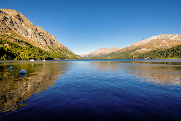 istock Sunset at Bay Plaun da Lej at Lake Sils (Switzerland) 1410692610