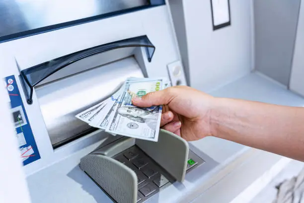 Atm machine money cash. Holding american bill cash. Woman withdraw money usd hundred dollar. Us dollar bill, bank credit card