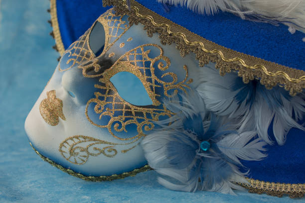 Venice, Italy - 1 March, 2025: Traditional Venetian Carnival 2025. People in carnival costumes pose for photographers
