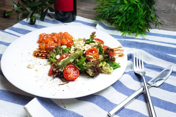 Salad With Salmon Crushed Cashew Nuts Cherry Tomatoes Balsamic