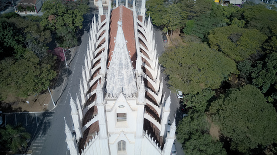 Taubate, Sao Paulo, Brazil - July 24, 2022: Aerial view of Santa Therezinha gothic church on a sunny day.