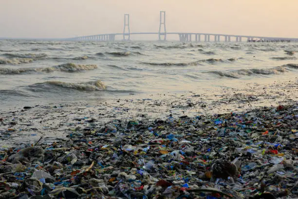 Madura, Indonesia, Oct 29, 2015. A wave of garbage in the waters near the Suramadu Bridge that connects Java and Madura islands in East Java.