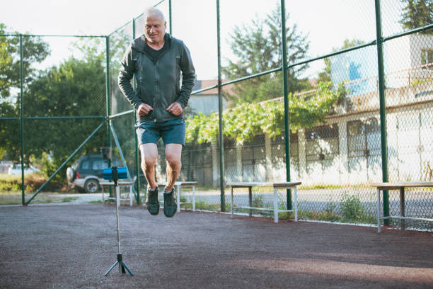 istock Active senior man recording video 1410713278