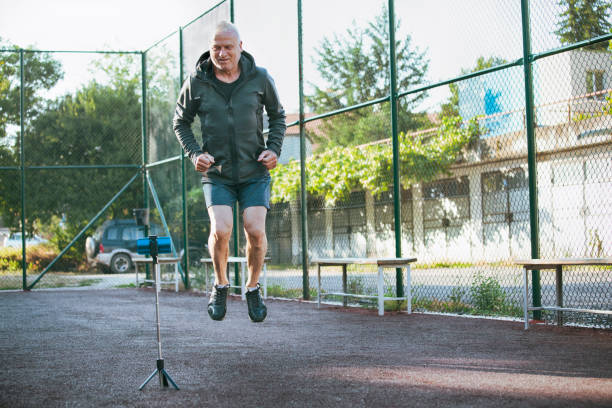 istock Active senior man recording video 1410713329