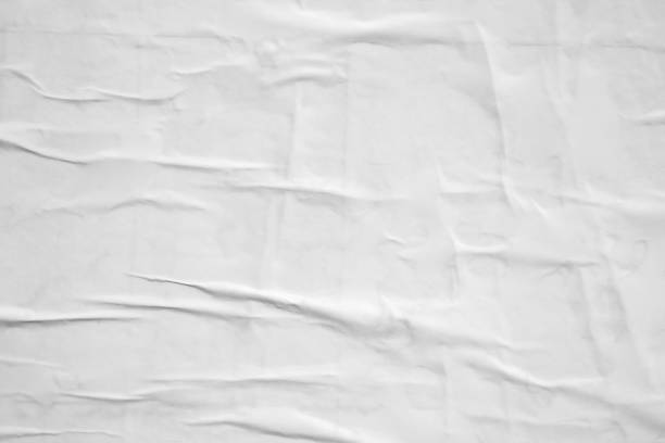 istock white crumpled and creased paper poster texture background 1410713507