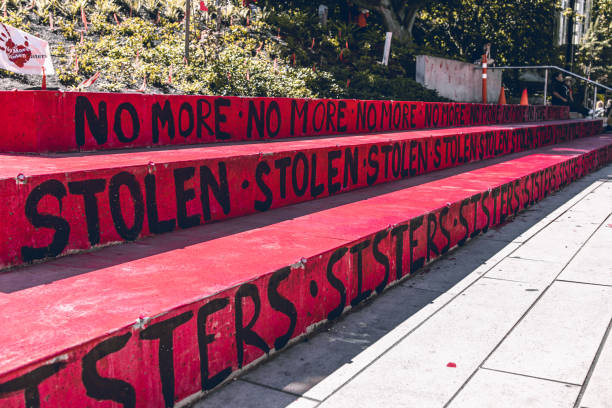 A sign with text No more stolen sisters on the Robson Square. Memorial to honour Missing and Murdered Indigenous Women in US and Canada stock photo