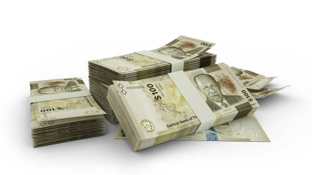 istock 3D Stack of 100 Bahamian dollar notes isolated on white background 1410741604
